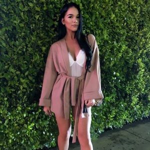 Two piece set. Cute overcoat with biker shorts.